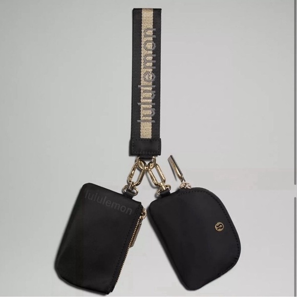 lululemon athletica Accessories - Lululemon Black & Gold Dual Pouch Wristlet. NWT.